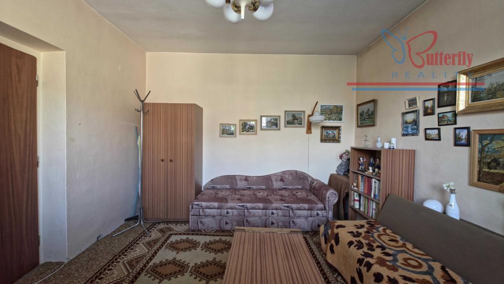 PREDAJ Rodinný dom s veľkorysým pozemkom v Handlovej – Robotnícka ulica