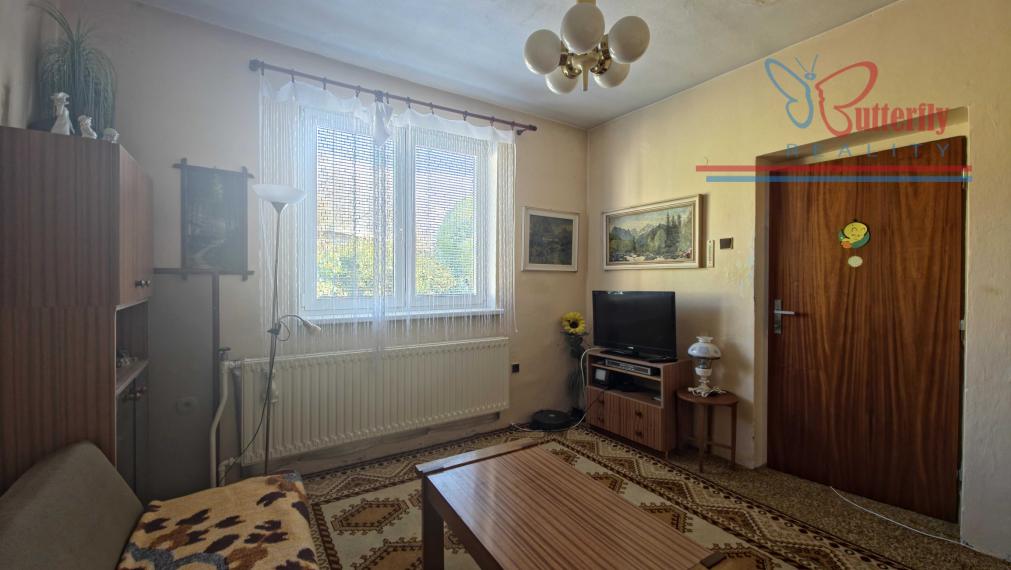 PREDAJ Rodinný dom s veľkorysým pozemkom v Handlovej – Robotnícka ulica