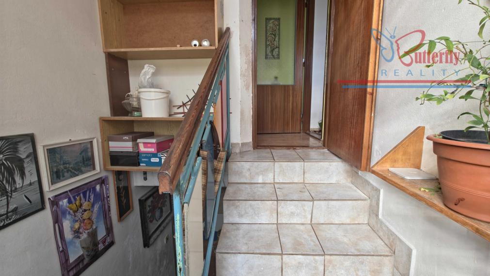 PREDAJ Rodinný dom s veľkorysým pozemkom v Handlovej – Robotnícka ulica