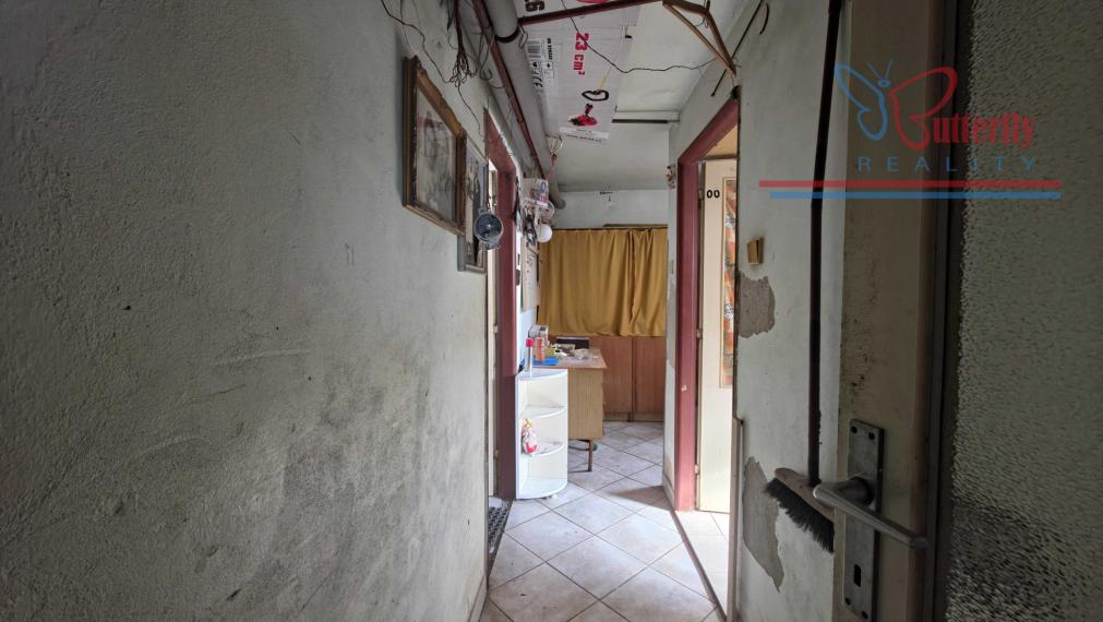 PREDAJ Rodinný dom s veľkorysým pozemkom v Handlovej – Robotnícka ulica