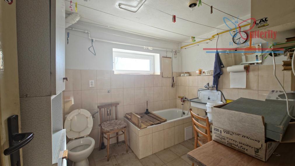 PREDAJ Rodinný dom s veľkorysým pozemkom v Handlovej – Robotnícka ulica